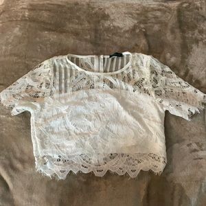 White top and shorts